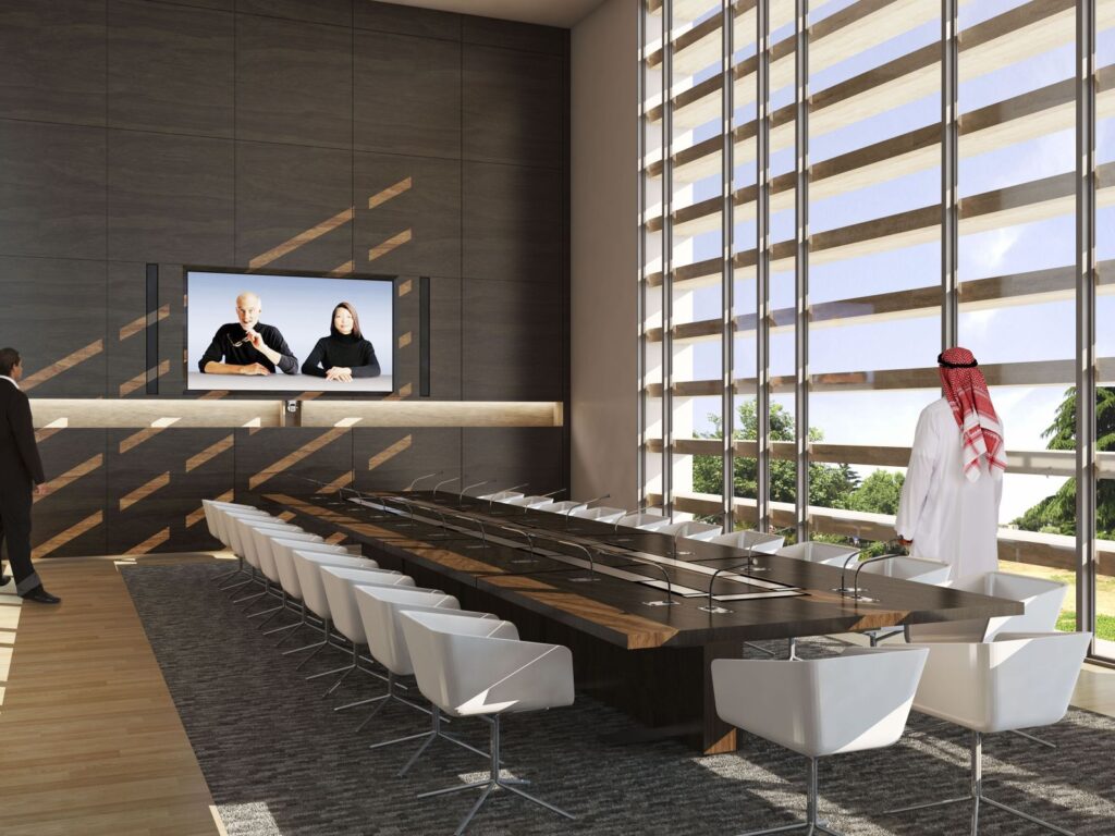 Interior 3D rendering of the Kuwait Embassy office with wooden walls, lots of natural light and a large table in the center of the room