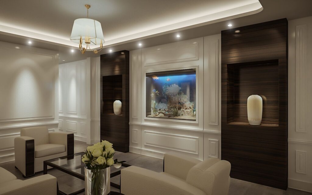 Interior 3D rendering of the J&CO Headquarter break room with wooden walls, a fish tank on the wall, and cream-colored armchairs
