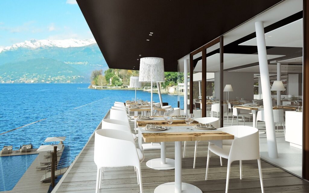 Exterior 3D rendering of the Hotel Sasso Moro restaurant decorated with wooden floor and with water view