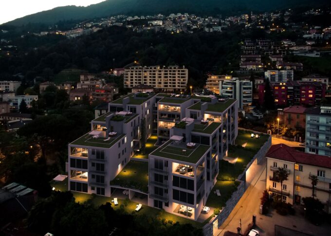 Urban 3D rendering of the Dolce Vita complete exterior view of the seven buildings at night, where you can see the good lighting they have