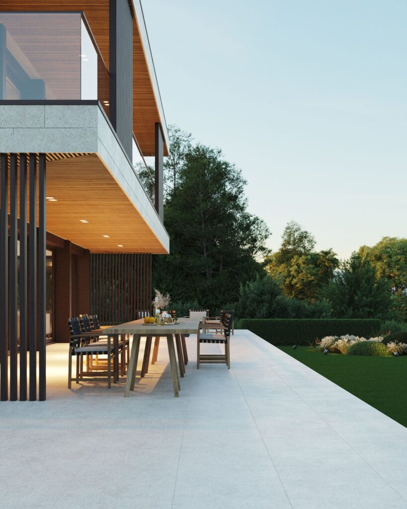 Exterior 3D rendering of the Casa Agretto park with an outdoor dining area and good lighting