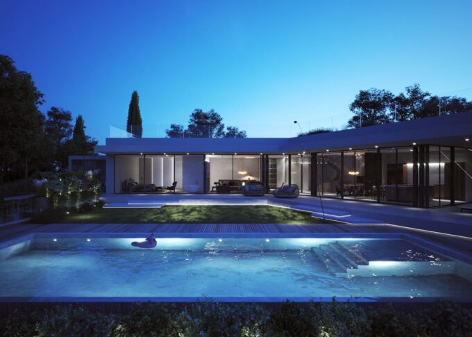 Exterior 3D rendering of the Villa night view with lights inside the pool and warm tones inside the building