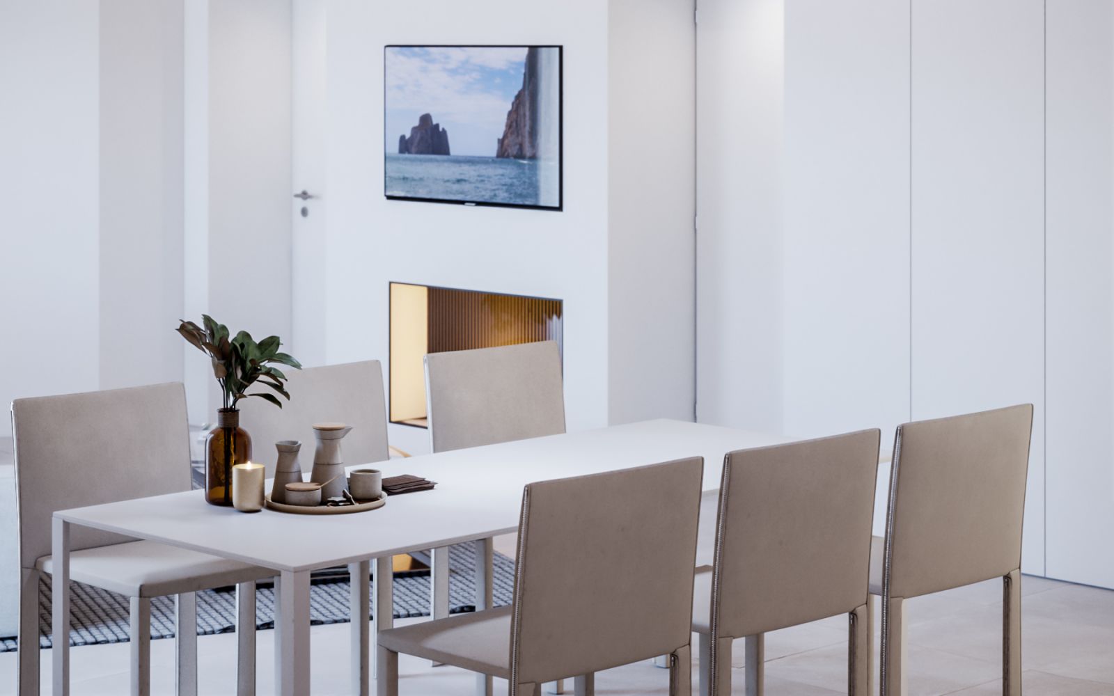 3D-Innenansicht des Esszimmers der Casa Pietrosa mit hellem Tisch und Stühlen und einem Kamin