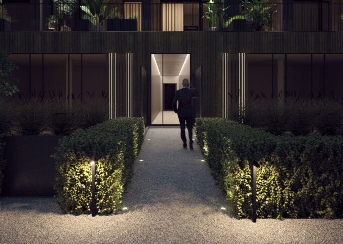 Urban 3D rendering of the Up town modern entrance, with good night lighting, decorative plants and many windows